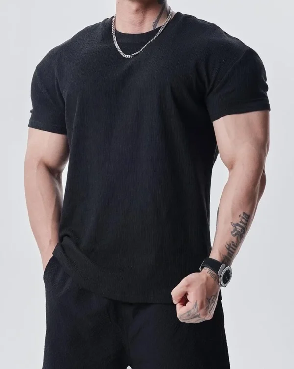 jpeg_m_f8af0668a6b3e248503bb1dfdb45a6b3_sx_582821_www1000-1333tplv-5mmsx3fupr-resize_1000_1333-e1744988822563 Textured Slim-Fit Men's Workout T-Shirt